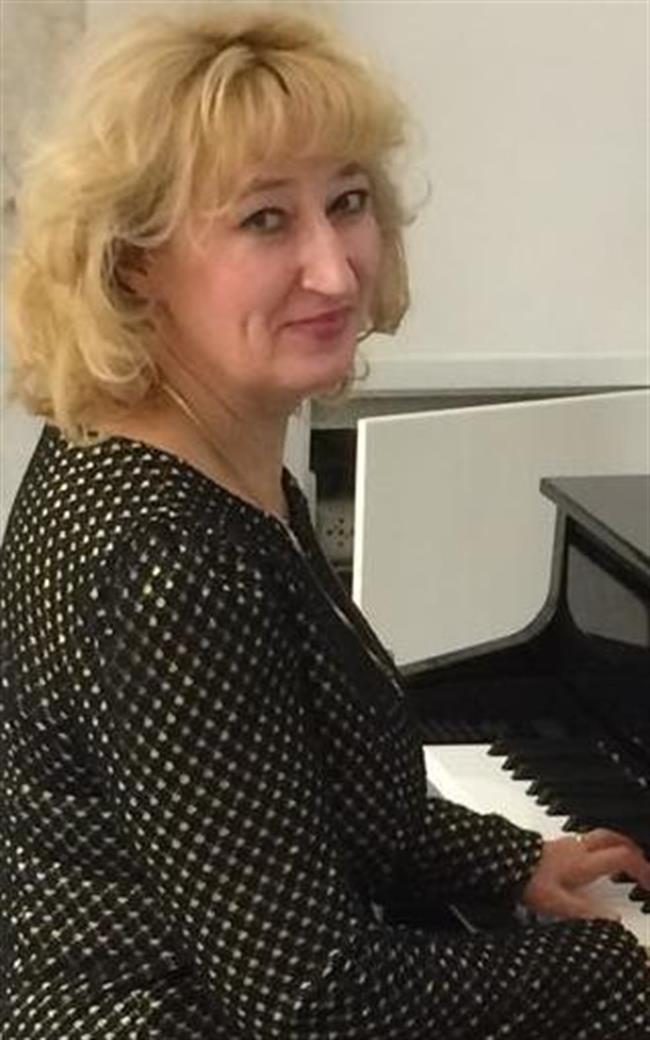 Марина Дмитриевна - репетитор по музыке