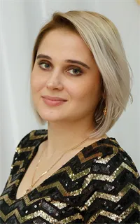 Юлия Юрьевна - репетитор по истории