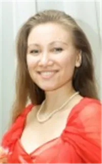 Евгения Олеговна - репетитор по музыке